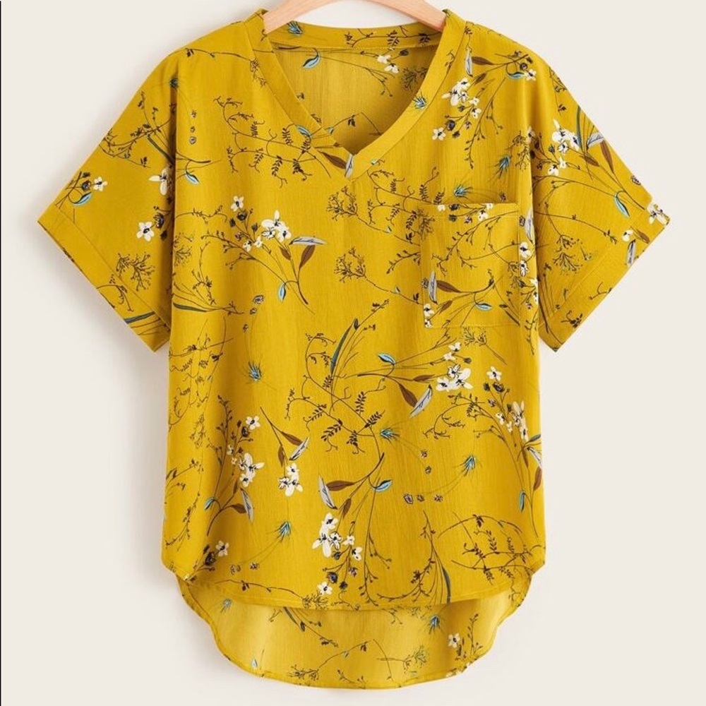 Plus dip hem floral print blouse